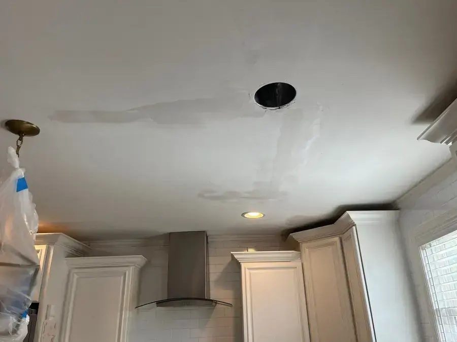 Water-stained ceiling around a light fixture in a Brentwood, TN kitchen